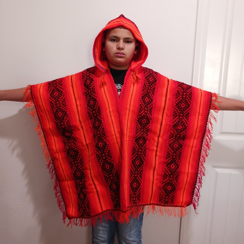 Peruvian unisex poncho with cap knitted in multicolored wool for warm winter